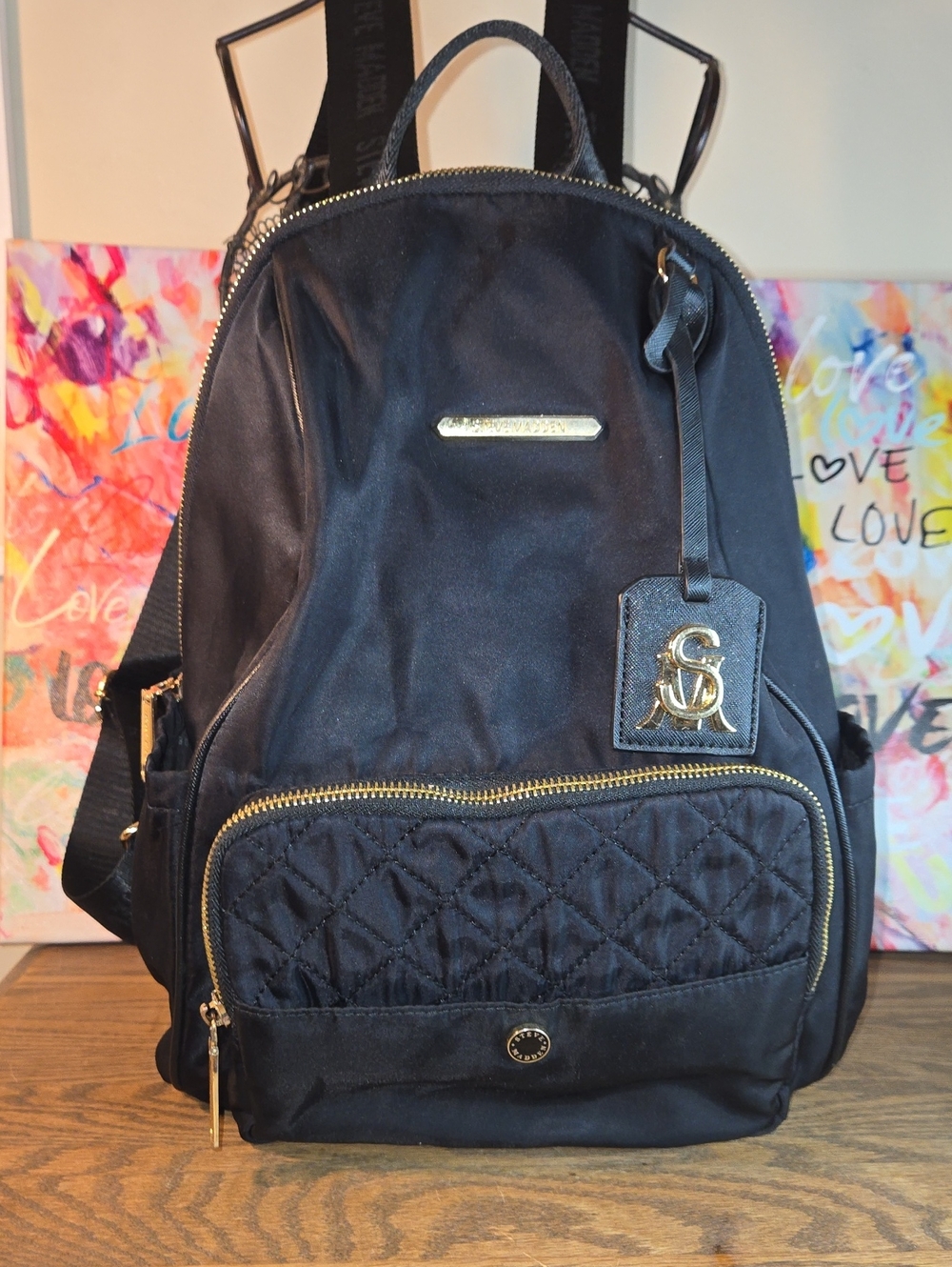 Steve Madden Black Quilted Front Backpack with Gold Accents